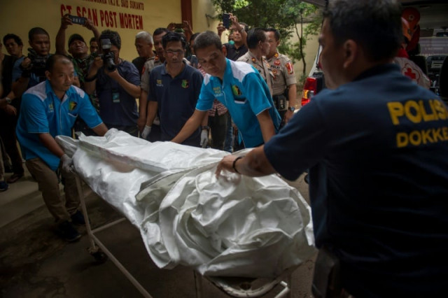 recovered remains from the doomed flight were sent to hospital for dna testing photo afp recovered remains from the doomed flight were sent to hospital for dna testing photo afp