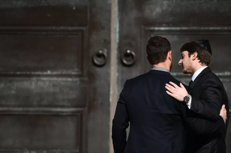 two men embrace as they arrive at the rodef shalom congregation for the funeral of cecil and david rosenthal brothers who were among the 11 victims of a mass shooting at the tree of life synagogue in pittsburgh pennsylvania photo afp two men embrace as they arrive at the rodef shalom congregation for the funeral of cecil and david rosenthal brothers who were among the 11 victims of a mass shooting at the tree of life synagogue in pittsburgh pennsylvania photo afp