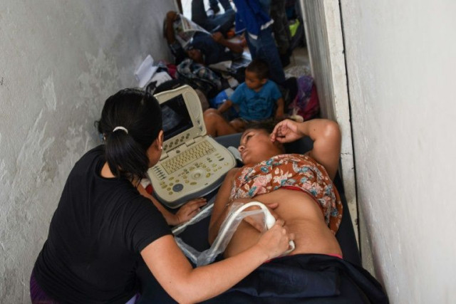 marisol hernandez believes there are 42 pregnant women amongst the thousands of mostly honduran migrants hoping to reach the united states photo afp marisol hernandez believes there are 42 pregnant women amongst the thousands of mostly honduran migrants hoping to reach the united states photo afp