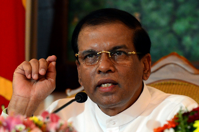 in this file photo taken on december 16 2016 sri lankan president maithripala sirisena talks after a welcoming ceremony at the malaysian prime minister 039 s office in putrajaya photo afp