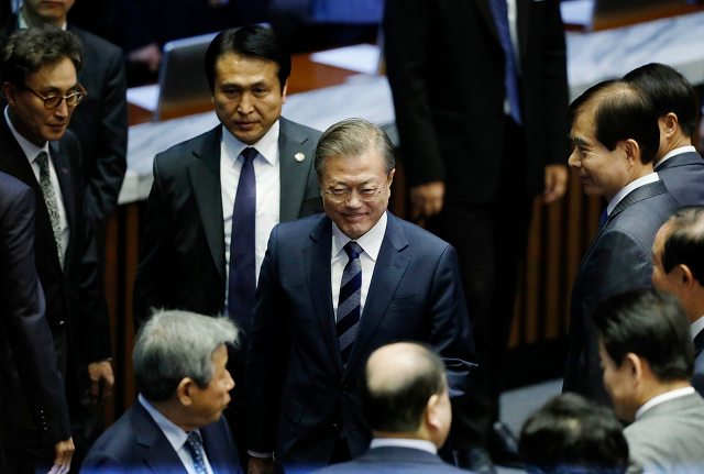 south korea 039 s president moon jae in c leaves after delivering a speech on the government 039 s 2019 budget proposal during a plenary session at the national assembly in seoul on november 1 2018 photo afp