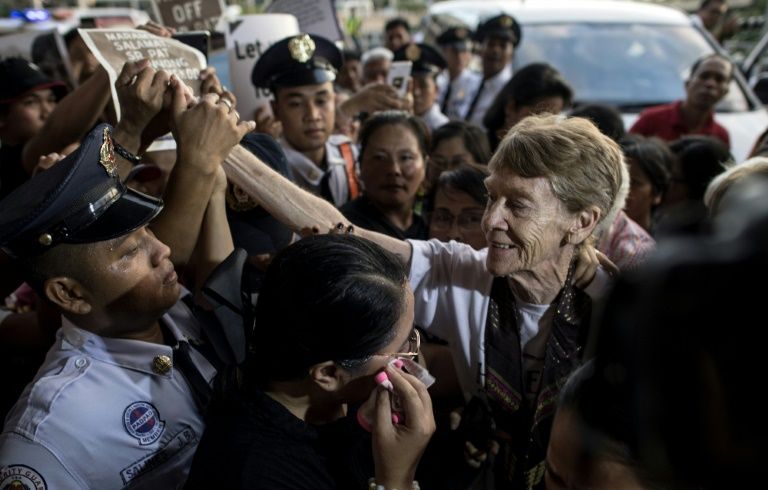 australian nun patricia fox was escorted to the airport by around 200 supporters after losing a lengthy legal fight to stay in the country photo afp