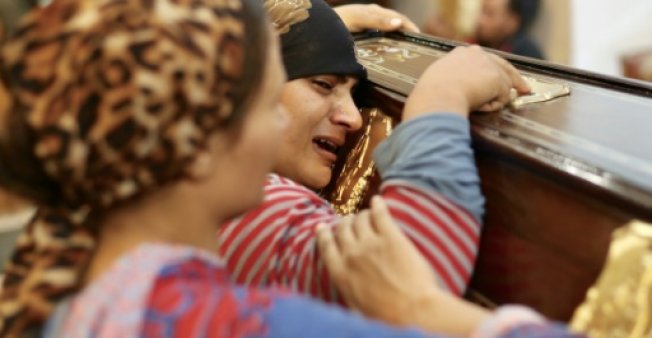 egyptian mourners attend the funeral of assad labib 35 at a church in sawaada village near minya city photo afp