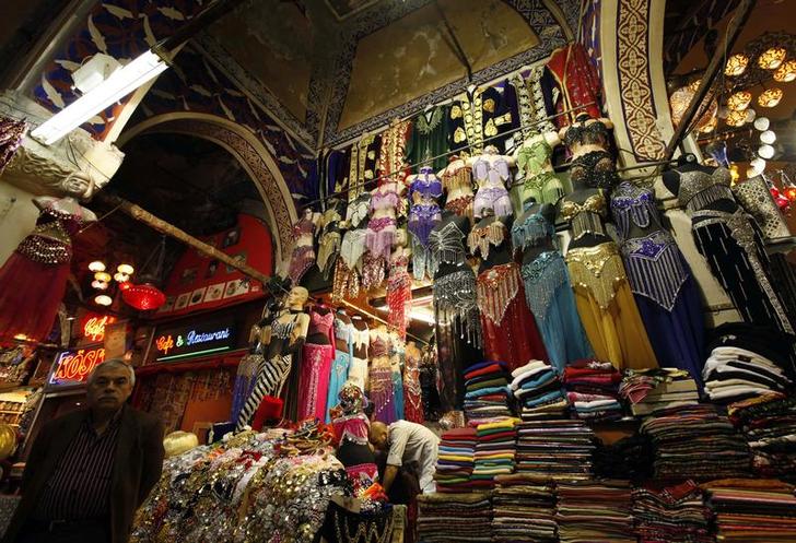 a shop vendor waits for customers in grand bazaar of istanbul photo reuters