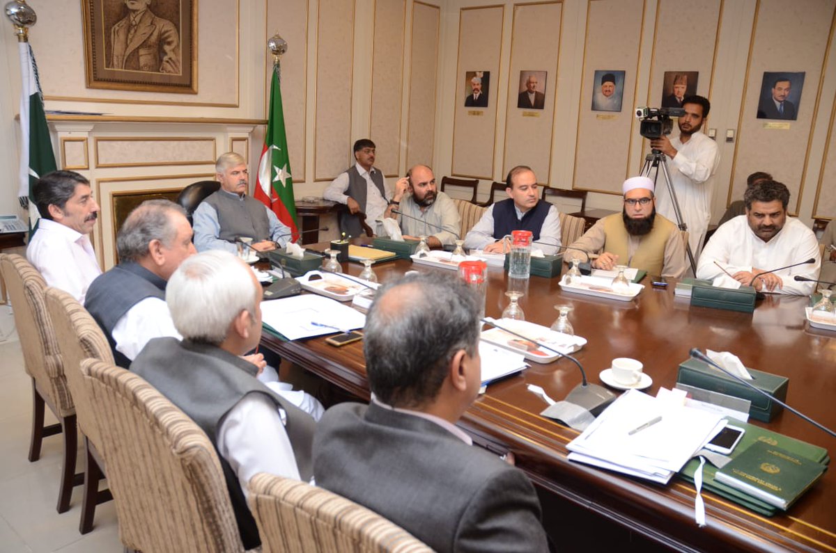 cm mahmood khan chairing a meeting photo pti