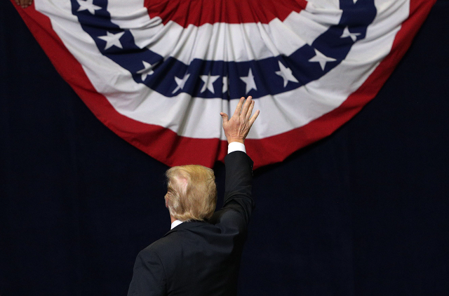 us president donald trump waves during a campaign rally for rep marsha blackburn r tn and other tennessee republican candidates at the mckenzie arena november 4 2018 in chattanooga tennessee photo afp