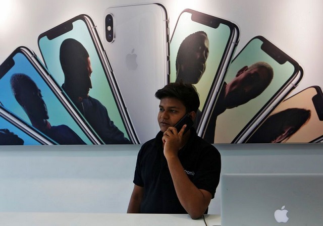 a salesperson speaks on the phone at an apple reseller store in mumbai india july 27 2018 picture taken july 27 2018 photo reuters