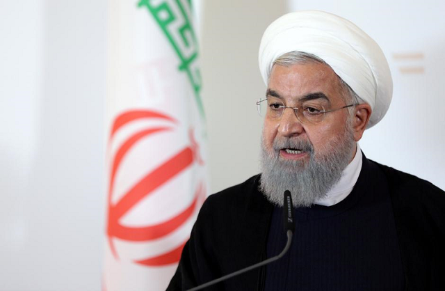 we are in a situation of economic war confronting a bullying power says rouhani photo reuters