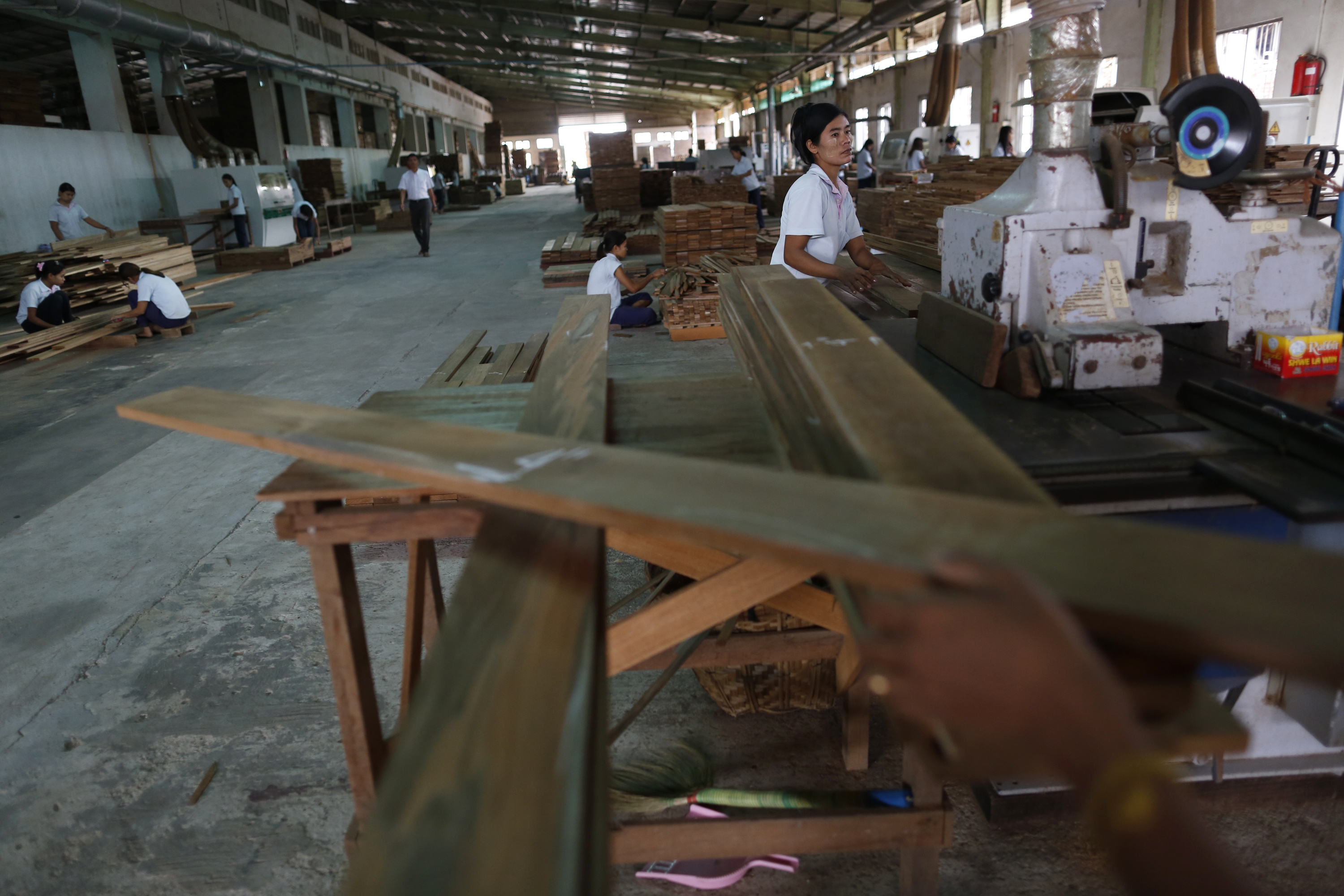 workers work at a teak parquet factory photo reuters
