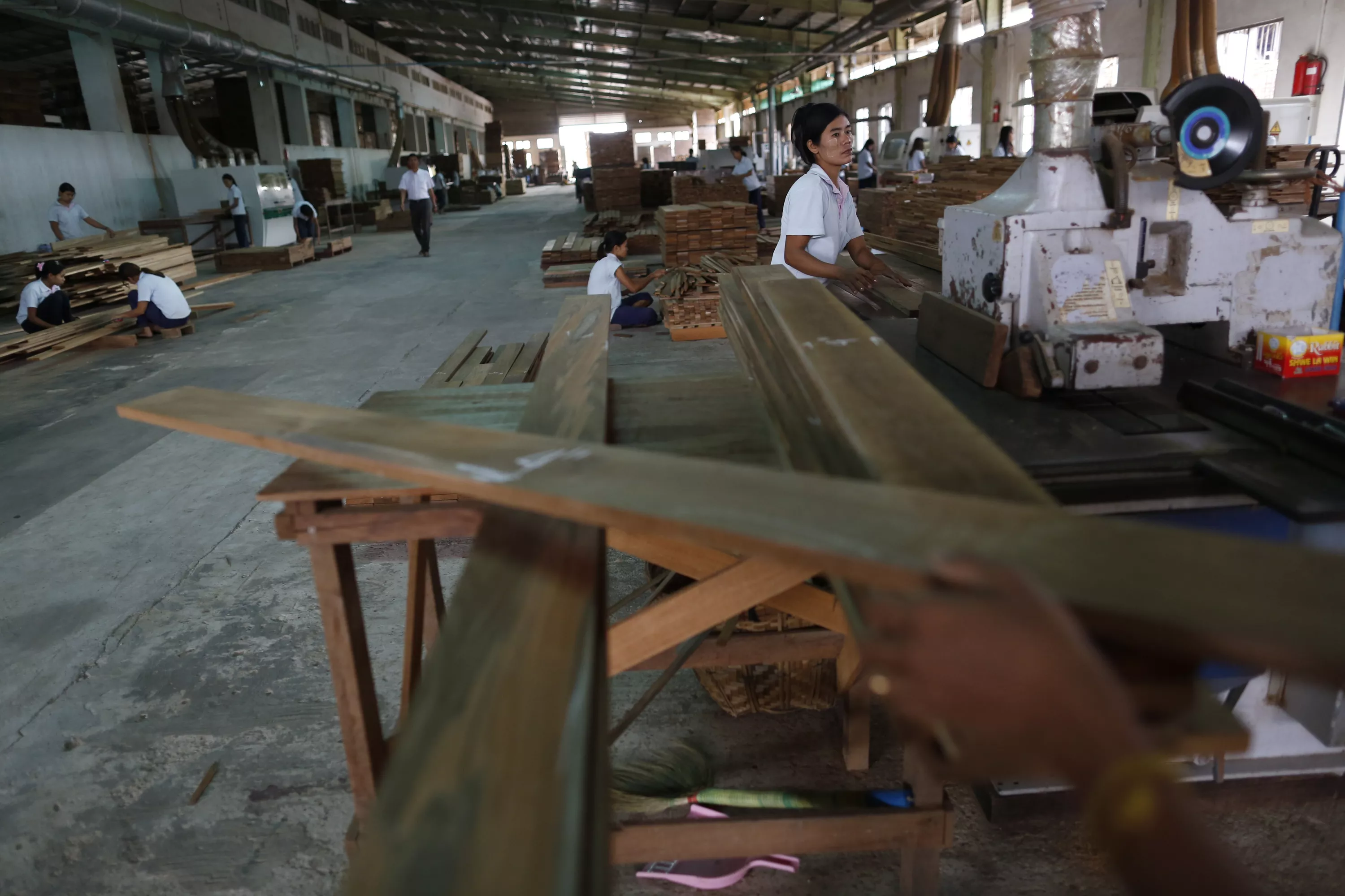 workers work at a teak parquet factory photo reuters workers work at a teak parquet factory photo reuters