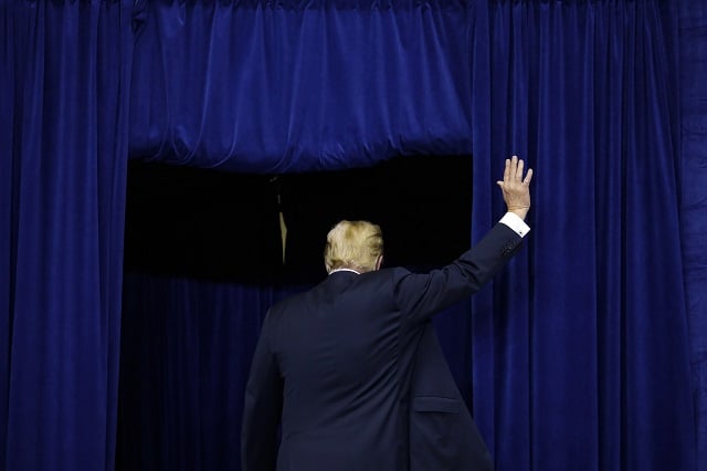 president donald trump departs following a campaign rally for republican senate candidate mike braun at allen county war memorial coliseum november 5 2018 in fort wayne indiana photo afp