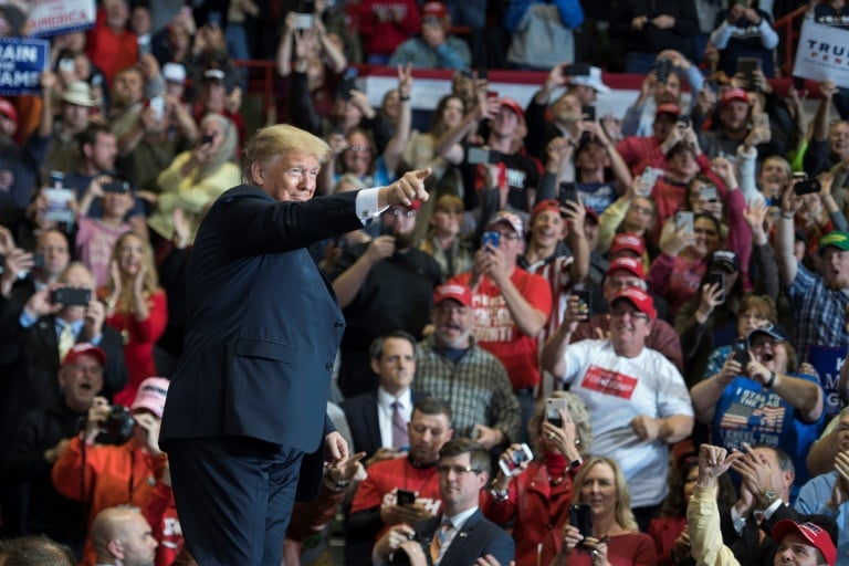 us president donald trump arrives at a make america great again rally in cape girardeau missouri the night before the election photo afp