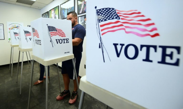voters cast their ballots for early voting at the los angeles county registrar 039 s office in norwalk california on november 5 2018 a day ahead the november 6 midterm elections in the united states photo afp voters cast their ballots for early voting at the los angeles county registrar 039 s office in norwalk california on november 5 2018 a day ahead the november 6 midterm elections in the united states photo afp
