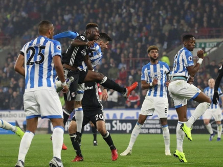 fosu mensah s first half own goal helps terriers beat fulham 1 0 photo afp