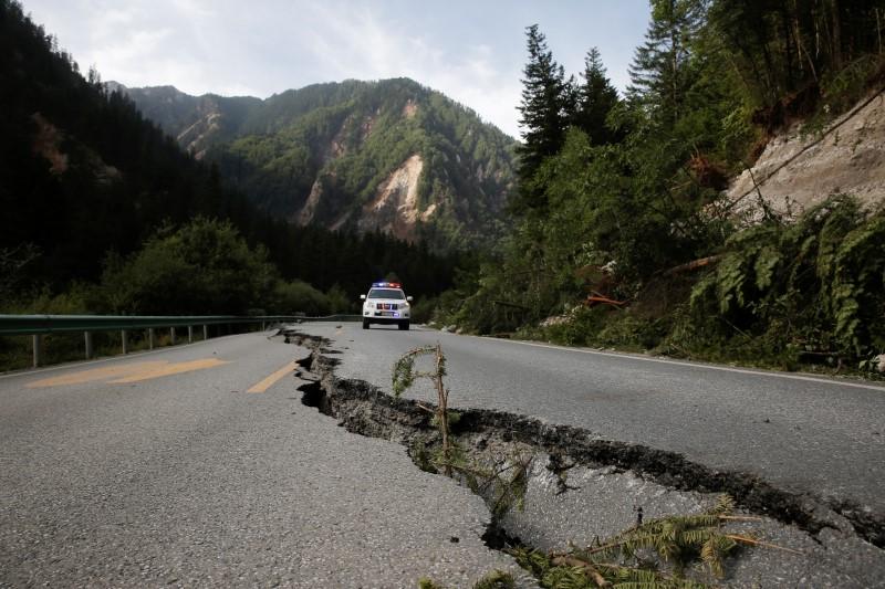 a crack runs through a mountain road photo reuters