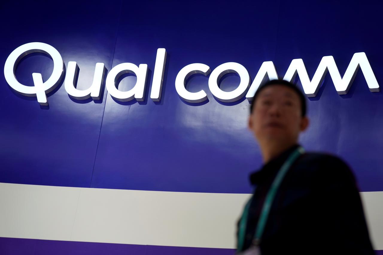 a qualcomm sign is seen during the china international import expo ciie photo reuters