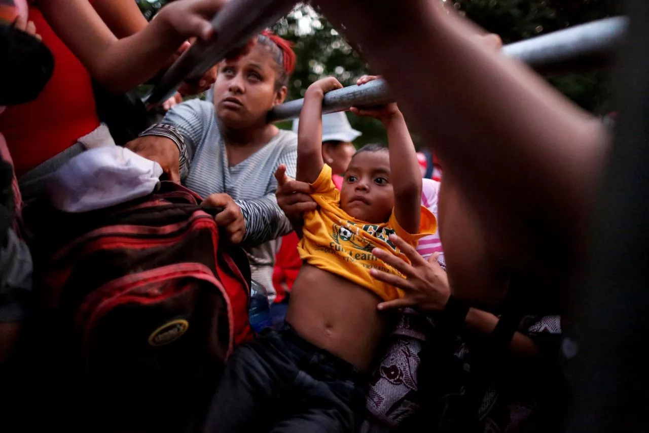 people belonging to a caravan of migrants from el salvador en route to the united states board a pick up truck for a hitchhike along the highway to ciudad tecun uman guatemala from moyuta guatemala photo reuters people belonging to a caravan of migrants from el salvador en route to the united states board a pick up truck for a hitchhike along the highway to ciudad tecun uman guatemala from moyuta guatemala photo reuters
