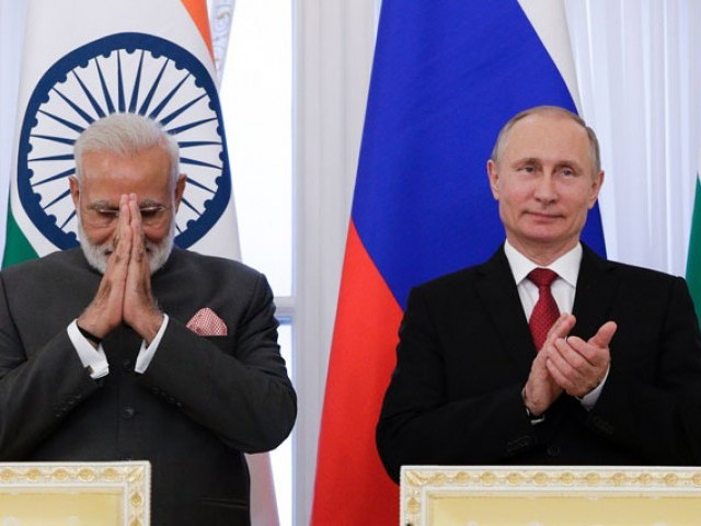 russian president vladimir putin r and indian prime minister narendra modi attend a signing ceremony following their meeting on the sidelines of the st petersburg international economic forum spief in saint petersburg on june 1 2017 photo afp