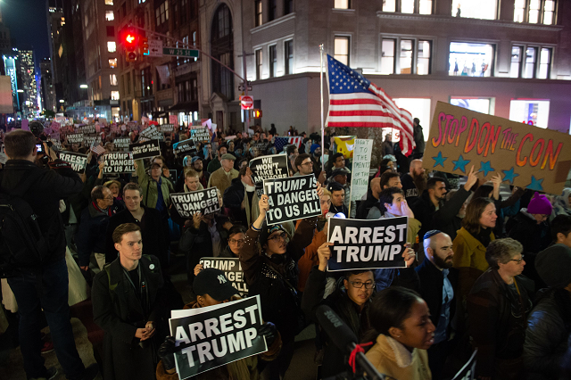 people protest and march against us president donald trump 039 s alleged interference in robert mueller 039 s investigation in new york city on november 8 2018 photo afp people protest and march against us president donald trump 039 s alleged interference in robert mueller 039 s investigation in new york city on november 8 2018 photo afp