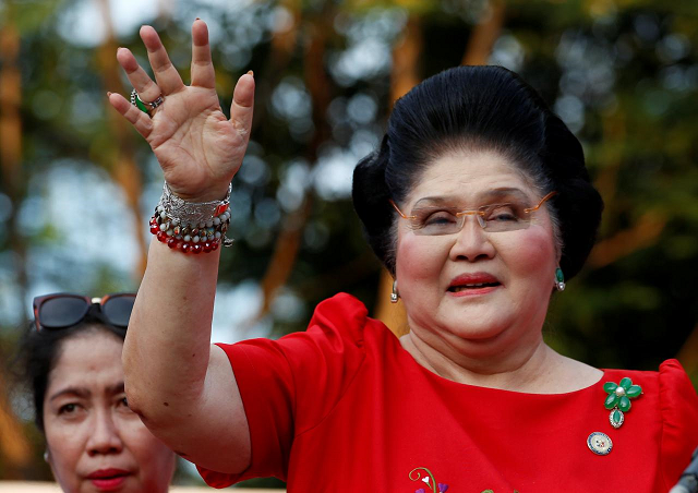 philippines former first lady and congresswoman imelda marcos waves to supporters as she takes part in the announcement of her son bongbong marcos 039 vice presidential candidacy in manila philippines october 10 2015 photo reuters