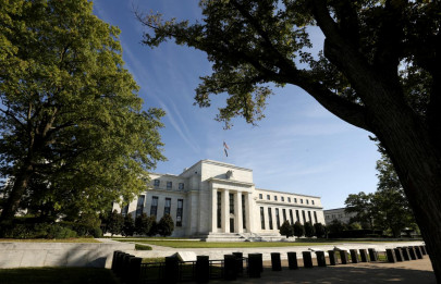 fed leaves rates unchanged says us economy strong