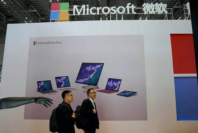 a microsoft sign is seen during the china international import expo ciie at the national exhibition and convention center in shanghai china november 5 2018 photo reuters a microsoft sign is seen during the china international import expo ciie at the national exhibition and convention center in shanghai china november 5 2018 photo reuters