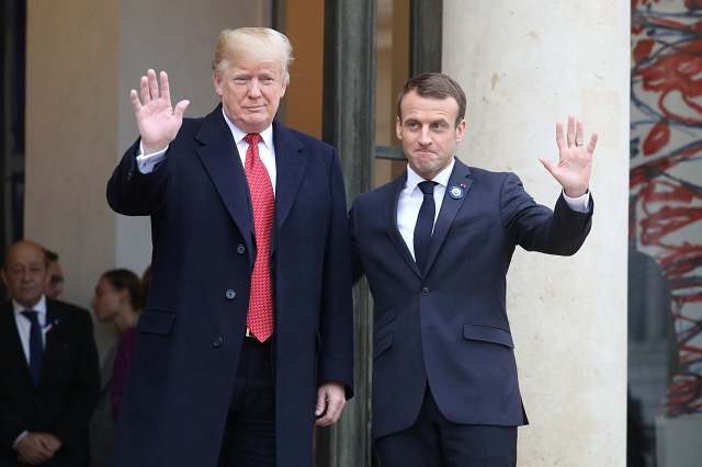 us president donald trump l is welcomed by french president emmanuel macron as he arrives for bilateral talks at the elysee palace in paris on november 10 2018 on the sidelines of commemorations marking the 100th anniversary of the 11 november 1918 armistice ending world war i photo afp