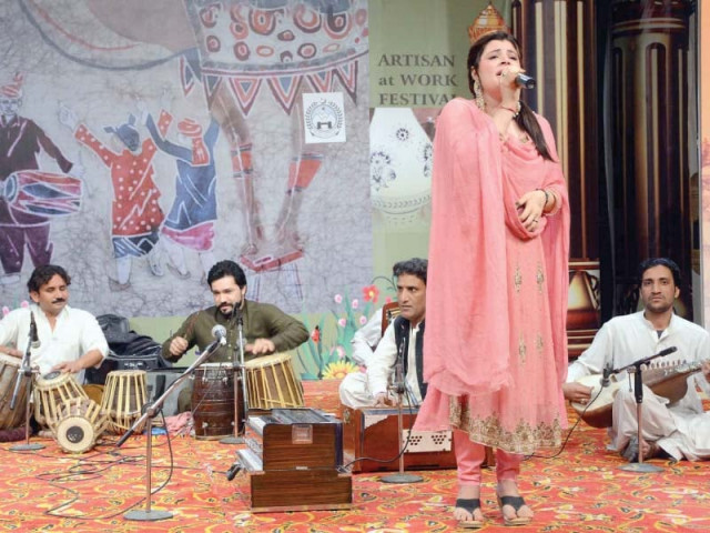a singer from g b performs at lok mela photo dna