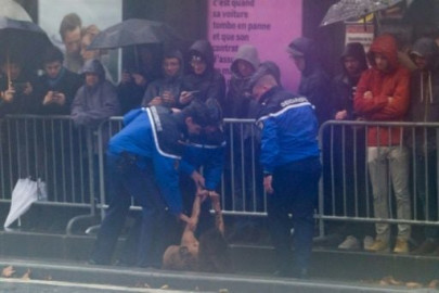 topless female protester runs at trump s motorcade in paris topless female protester runs at trump s motorcade in paris