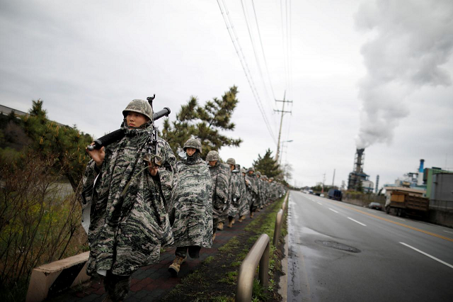 south korean marines march during a military exercise as a part of the annual joint military training called foal eagle between south korea and the us in pohang south korea april 5 2018 photo reuters south korean marines march during a military exercise as a part of the annual joint military training called foal eagle between south korea and the us in pohang south korea april 5 2018 photo reuters