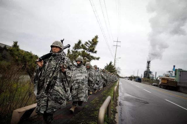 south korean marines march during a military exercise as a part of the annual joint military training called foal eagle between south korea and the us in pohang south korea april 5 2018 photo reuters south korean marines march during a military exercise as a part of the annual joint military training called foal eagle between south korea and the us in pohang south korea april 5 2018 photo reuters