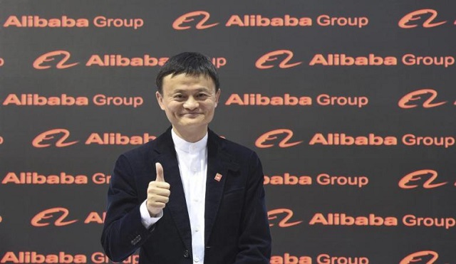 alibaba founder and chairman jack ma poses for the media while touring the cebit trade fair in hanover march 16 2015 photo reuters