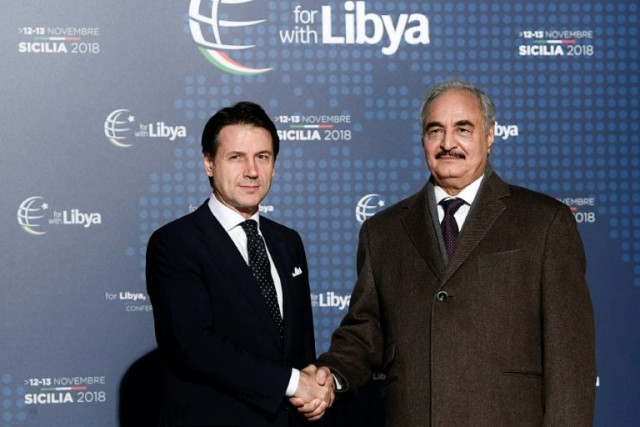 turkey walked out of peace talks after eastern libyan strongman khalifa haftar r joined a meeting on the conference 039 s sidelines with his un backed rival prime minister fayez al sarraj and other leaders but not turkey photo afp
