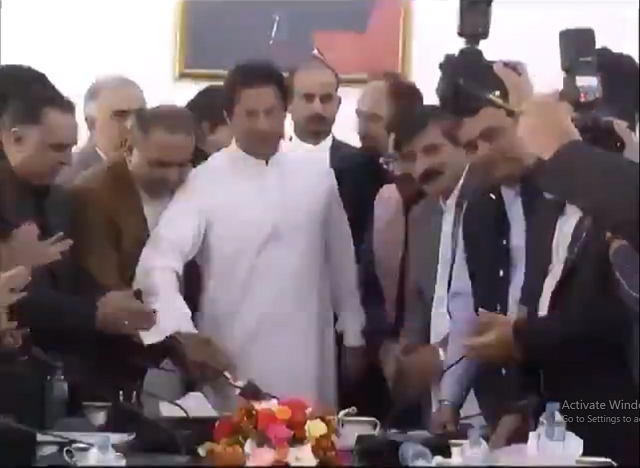 in a video shared by the pakistan tehreek e insaf pti official twitter handle the country 039 s premier can be seen cutting a cake to celebrate the hindu festival on the invitation of pakistan tehreek e insaf s minority mna dr ramesh kumar vankwani screengrab twitter ptiofficial