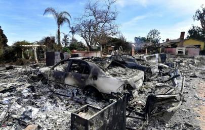 firefighters battle blazes on two fronts in california 50 dead