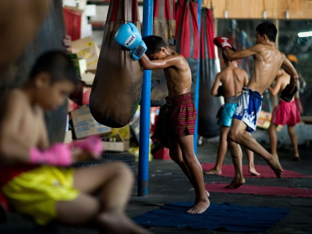 in thailand children start practicing muay thai from a very early age and it is not uncommon for children as young as eight to take part in tournaments photo afp