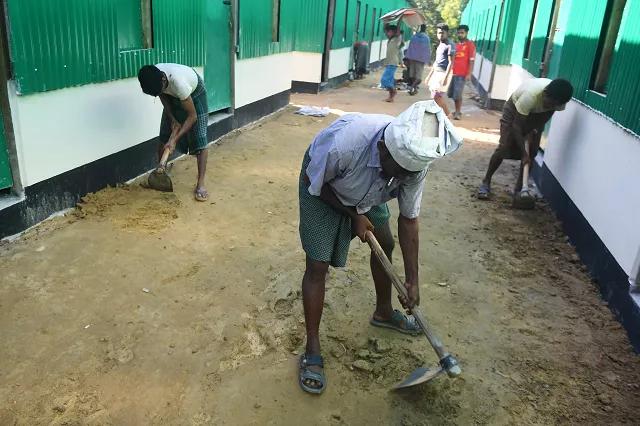 bangladeshi labourers work in the construction site of the quot transit camp quot set up for the repatriation of rohingya refugees at the kutupalong refugee camp in ukhia on november 15 2018 photo afp bangladeshi labourers work in the construction site of the quot transit camp quot set up for the repatriation of rohingya refugees at the kutupalong refugee camp in ukhia on november 15 2018 photo afp