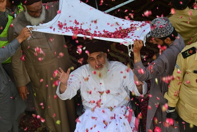 khadim hussain rizvi attends an election campaign rally in karachi photo afp khadim hussain rizvi attends an election campaign rally in karachi photo afp