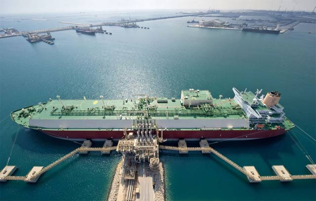 a ship loads up with liquid natural gas of which qatar is the world 039 s biggest exporter photo source qatar petroleum