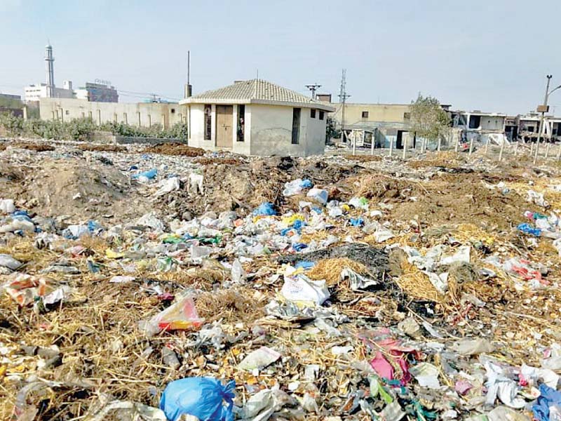 heaps of garbage dumped outside ayesha park photo express