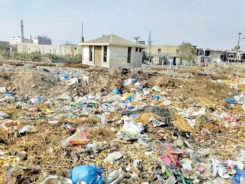 heaps of garbage dumped outside ayesha park photo express heaps of garbage dumped outside ayesha park photo express