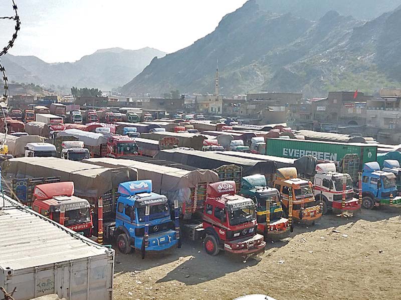 trucks parked near torkhan border crossing as customs clearing agents go on strike photo express