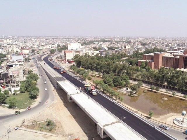 a view of the ongoing construction work of shaukat khanum flyover photo file a view of the ongoing construction work of shaukat khanum flyover photo file
