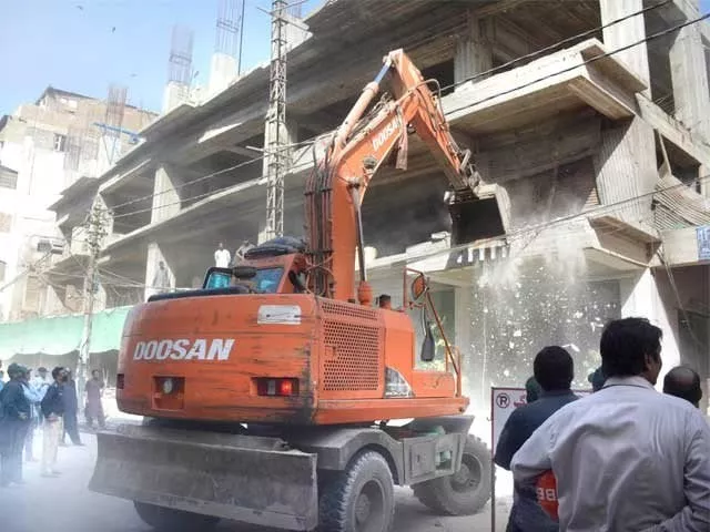karachi metropolitan corporation 039 s anti encroachment team demolishes a newly constructed building at empress market saddar photo express karachi metropolitan corporation 039 s anti encroachment team demolishes a newly constructed building at empress market saddar photo express