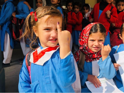 tayyaba poses with her marked finger during the polio vaccination drive in her school photo express