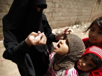 polio workers battle weather to inoculate children polio workers battle weather to inoculate children