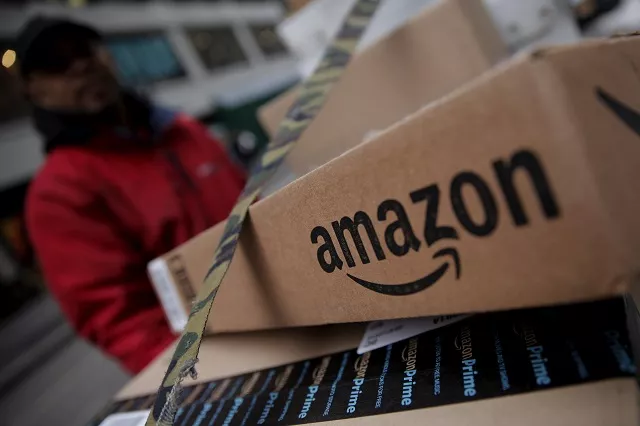 amazon boxes are seen stacked for delivery in the manhattan borough of new york city january 29 2016 photo reuters amazon boxes are seen stacked for delivery in the manhattan borough of new york city january 29 2016 photo reuters
