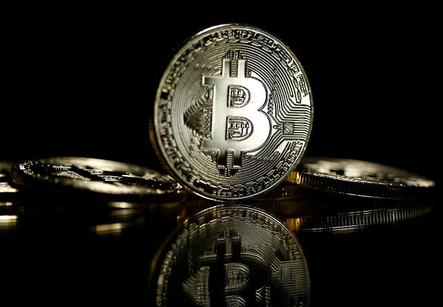 bitcoins are seen in this illustration picture photo reuters bitcoins are seen in this illustration picture photo reuters