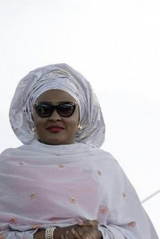 nigerian president mohammadu buhari arrives with his wife aisha before taking oath of office at the eagles square in abuja on may 29 2015 photo afp file nigerian president mohammadu buhari arrives with his wife aisha before taking oath of office at the eagles square in abuja on may 29 2015 photo afp file