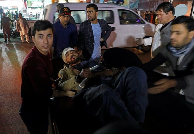 afghan men carry an injured person to a hospital after a suicide attack in kabul afghanistan november 20 2018 photo reuters afghan men carry an injured person to a hospital after a suicide attack in kabul afghanistan november 20 2018 photo reuters